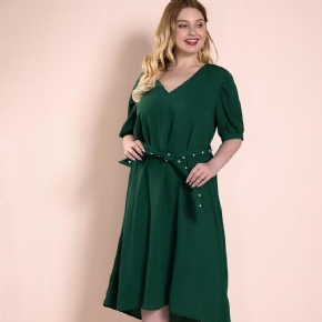 Robe Verte Sur Le Genou